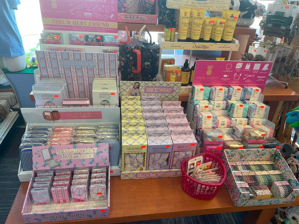Table of soaps, bath products, and boxed gift sets in the gift shop