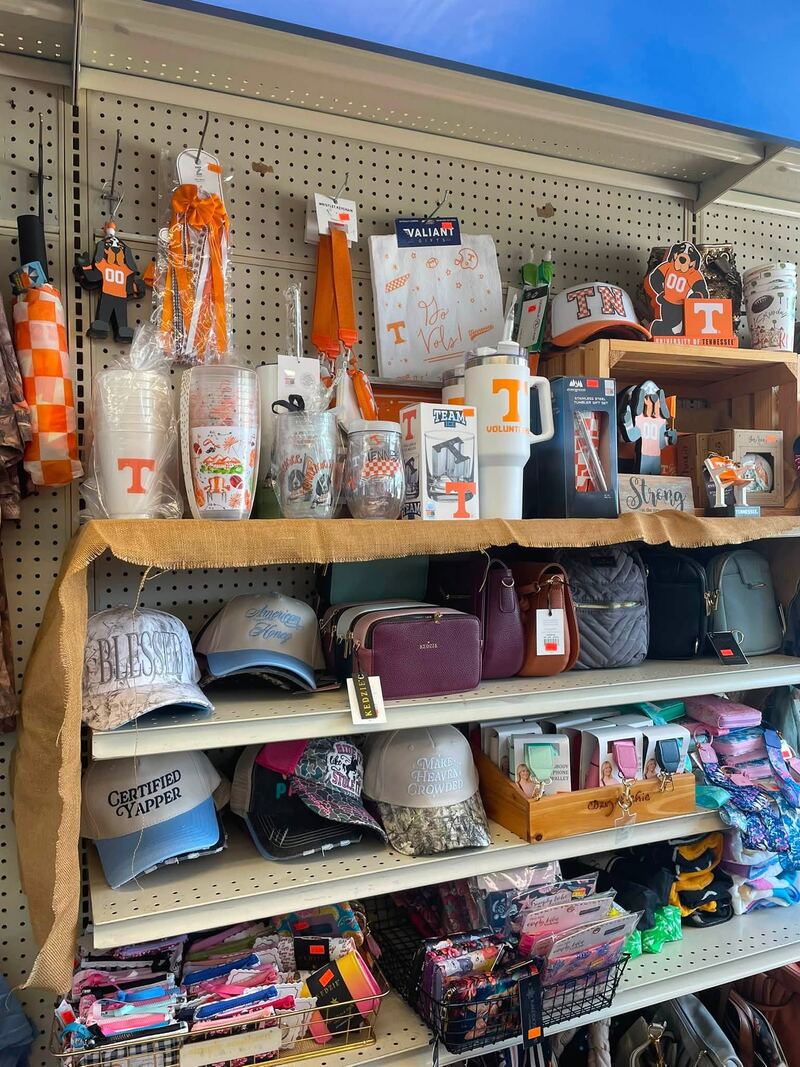 Shelves of Tennessee-themed cups, hats, and accessories in the gift shop